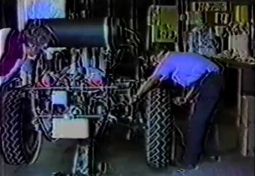 Stan Meyer and Associate Inspecting the Dunebuggy in the Shop