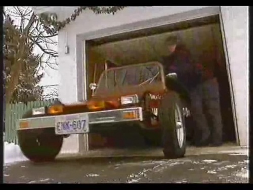 Stan Pushing the Dunebuggy Out of His Garage